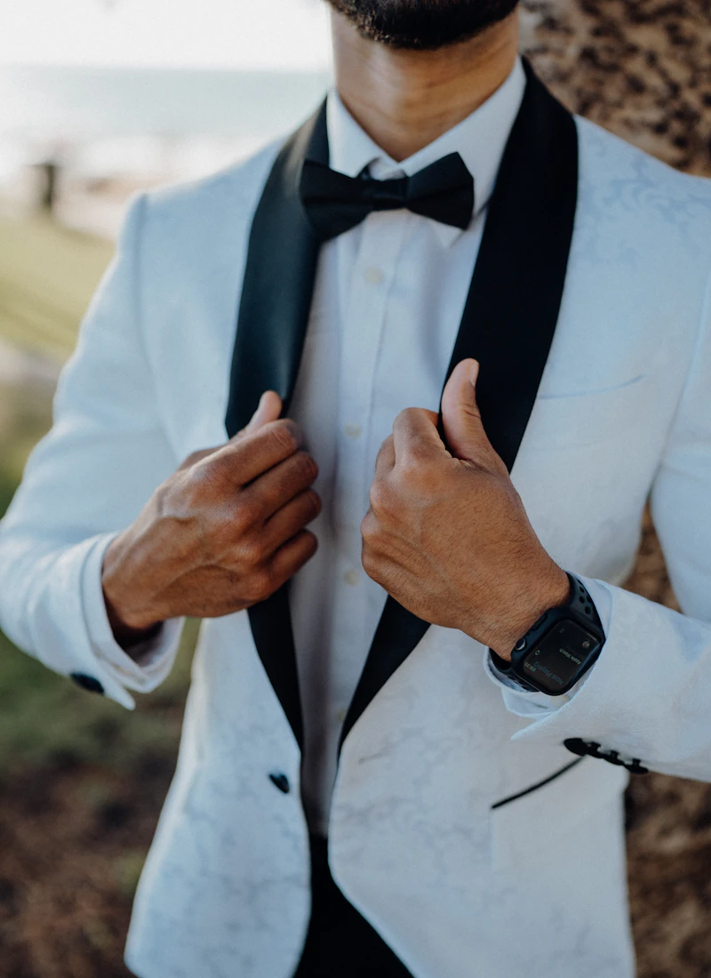Man wearing an ivory lapel tuxedo