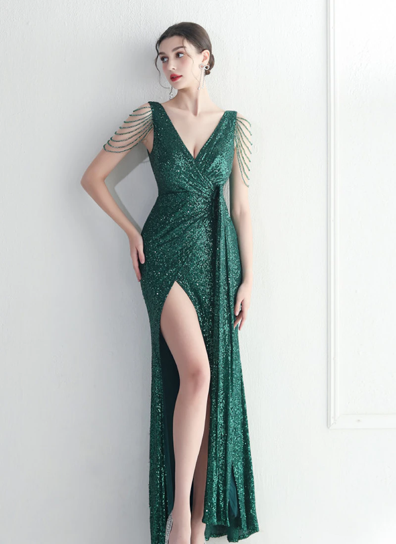 Woman wearing an emerald gala gown