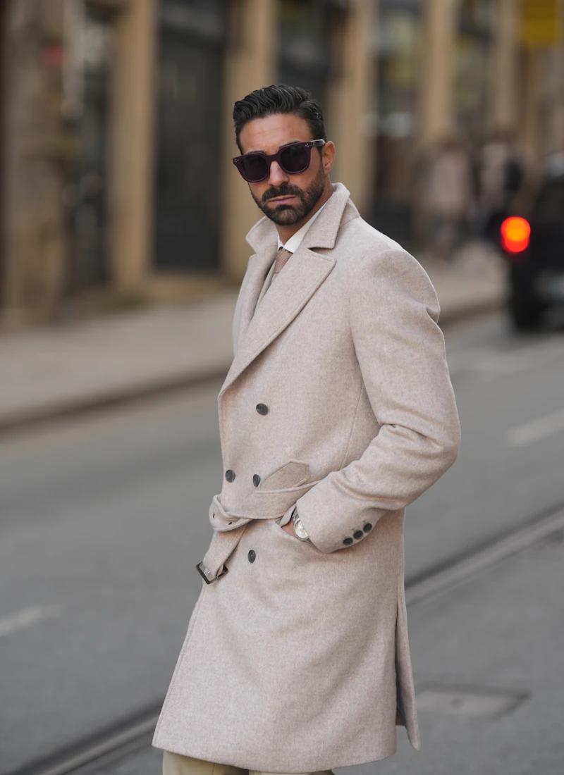 Man wearing a sand-coloured luxury overcoat